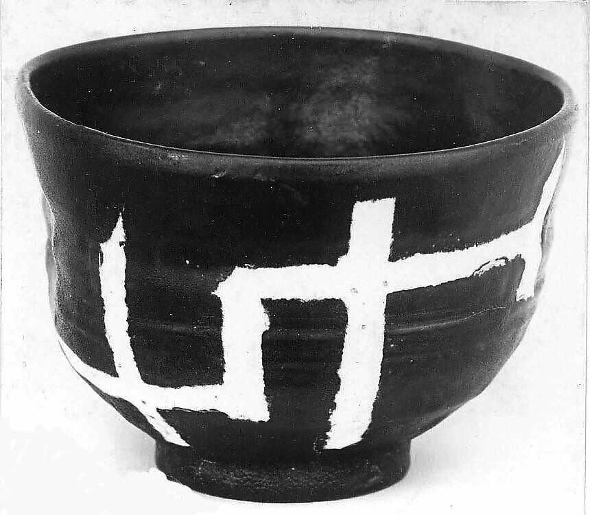 Teabowl, Pottery covered with glaze, ornamented on one side in white (Kyoto ware), Japan 