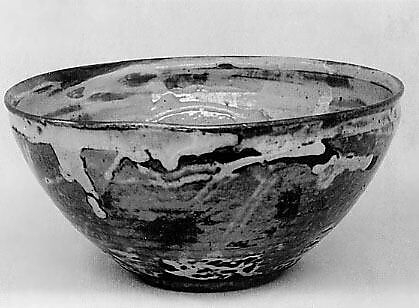 Teabowl, Clay burned red, covered with a mottled glaze (Kyoto ware), Japan 