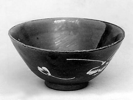 Bowl, Clay inlaid with design in white slip covered with a transparent crackled glaze, Japan 