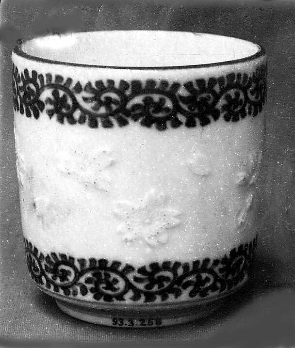 Cup, White porcelain with designs in relief and decorated with blue under the glaze (Hirado ware), Japan 