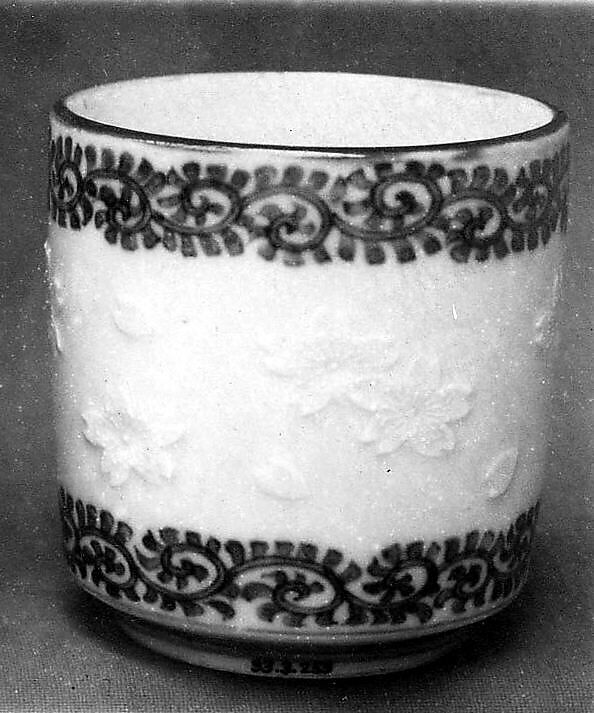Cup, White porcelain with designs in relief and decorated with blue under the glaze (Hirado ware), Japan 