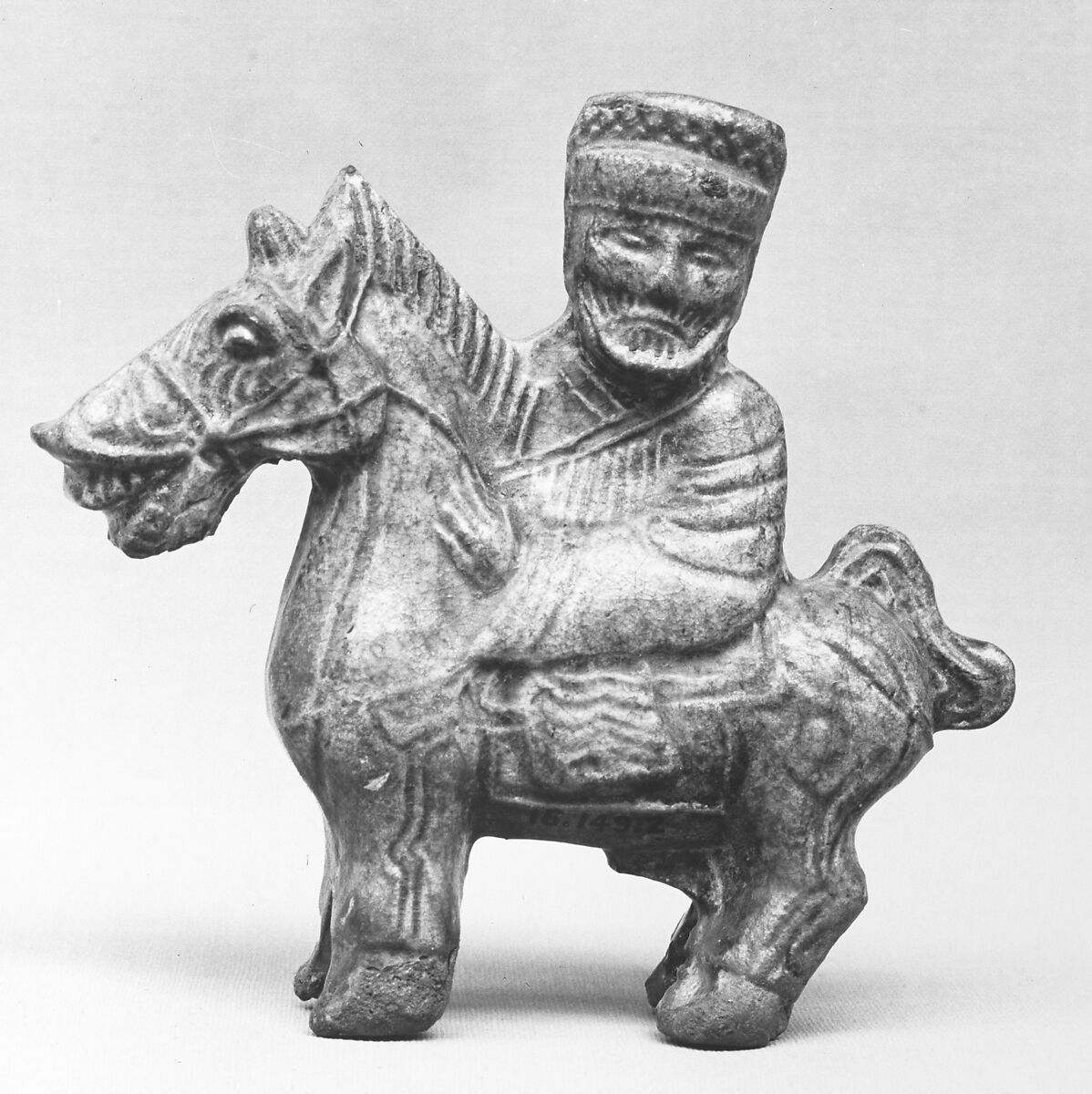 Horse and rider, Earthenware with green glaze, China 