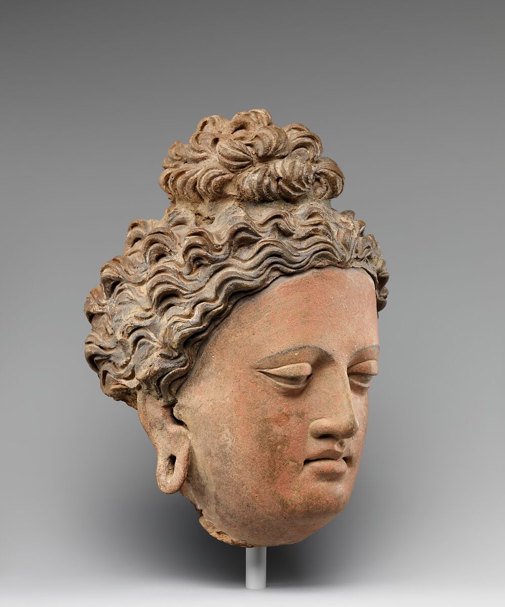 Head of a Buddha, Clay with pigments, Pakistan (ancient region of Gandhara) or Afghanistan