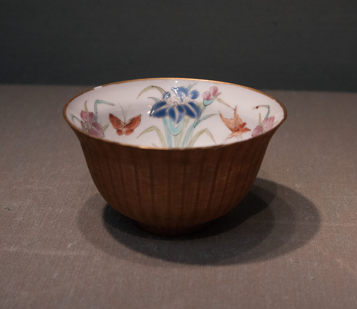 Cup with Butterflies-and-Iris Design and Basketry Exterior, Zōshuntei Sanpo (brand name used 1841–78), Porcelain with overglaze polychrome enamels, fine basketwork exterior (Arita ware, product of Hisatomi Yojibei), Japan 