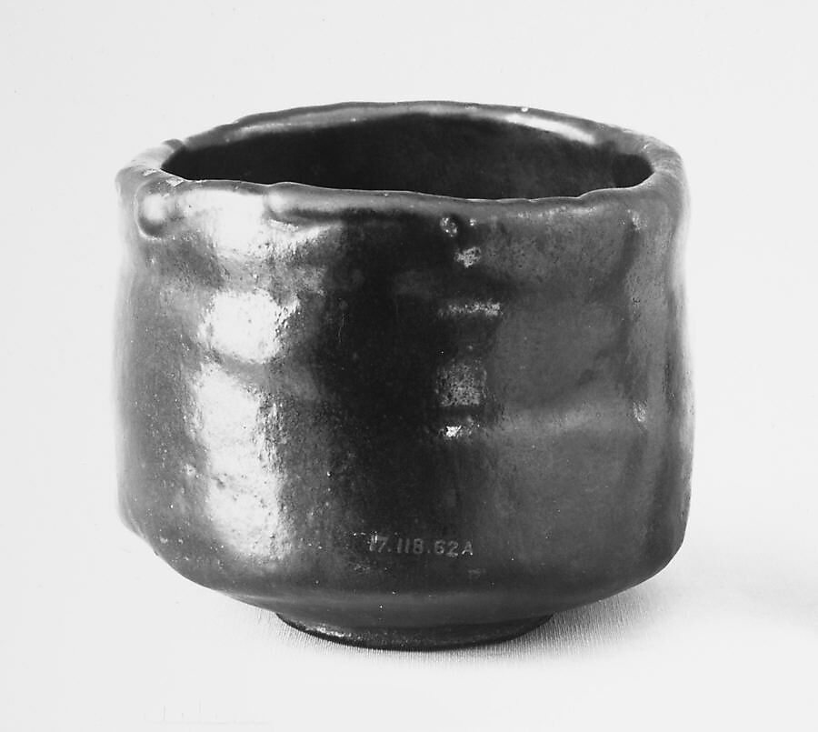 Teabowl, Clay covered with a dull black glaze. Name Seiran (Ko raku), Japan 