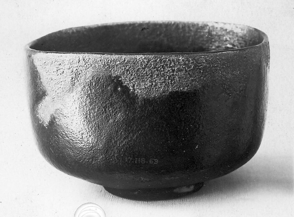Teabowl, Tokunyu (Japanese, died ca. 1775), Clay partly covered with a dull black glaze (Raku ware), Japan 