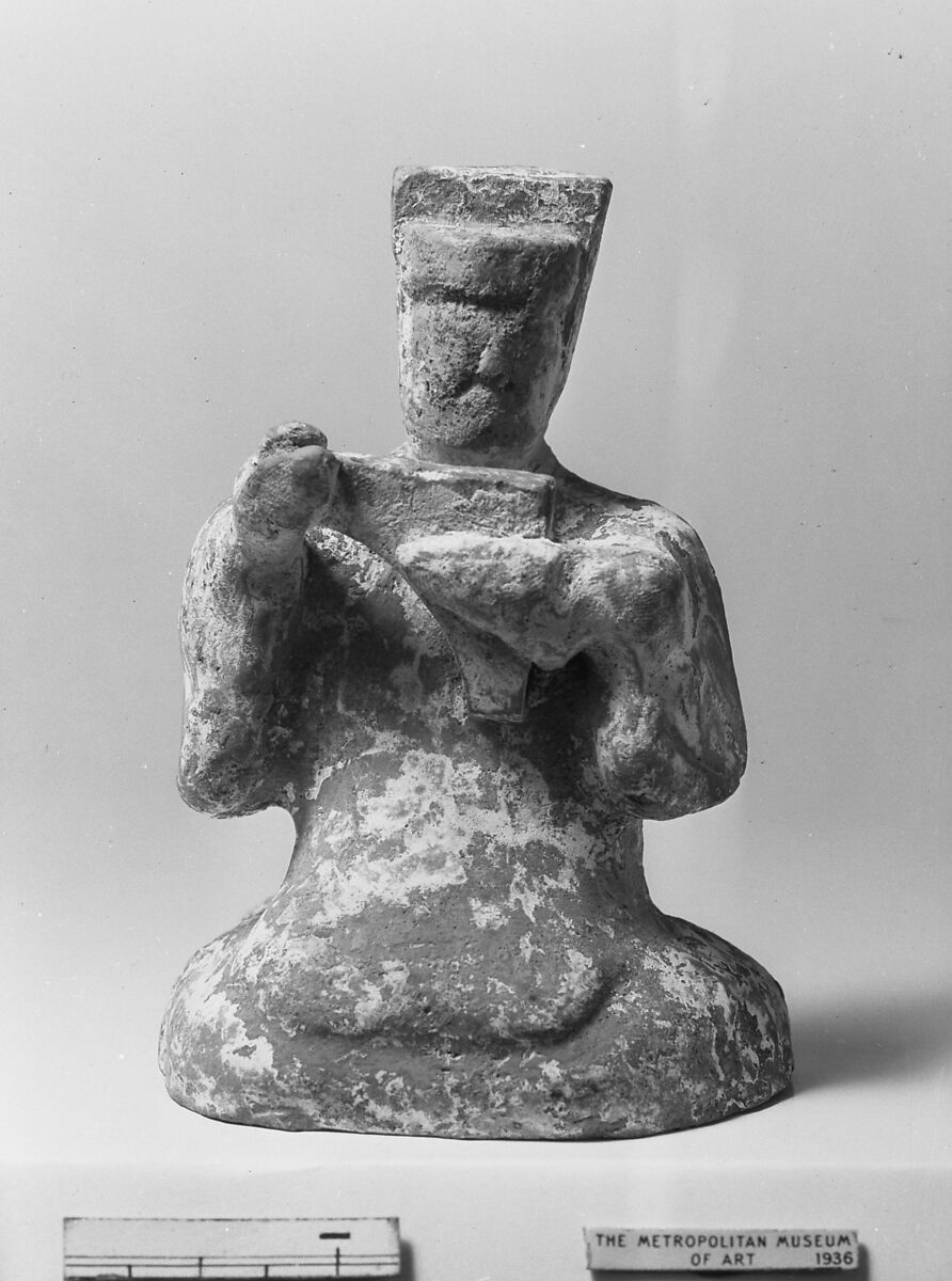 Figure of Entertainer, Pottery with slip and traces of red paint, China 