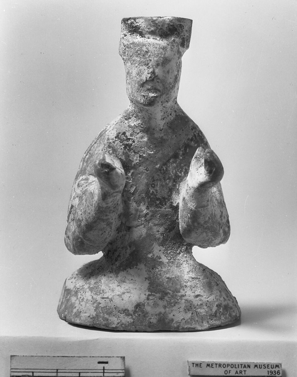 Figure of Entertainer, Pottery with slip and traces of red paint, China 