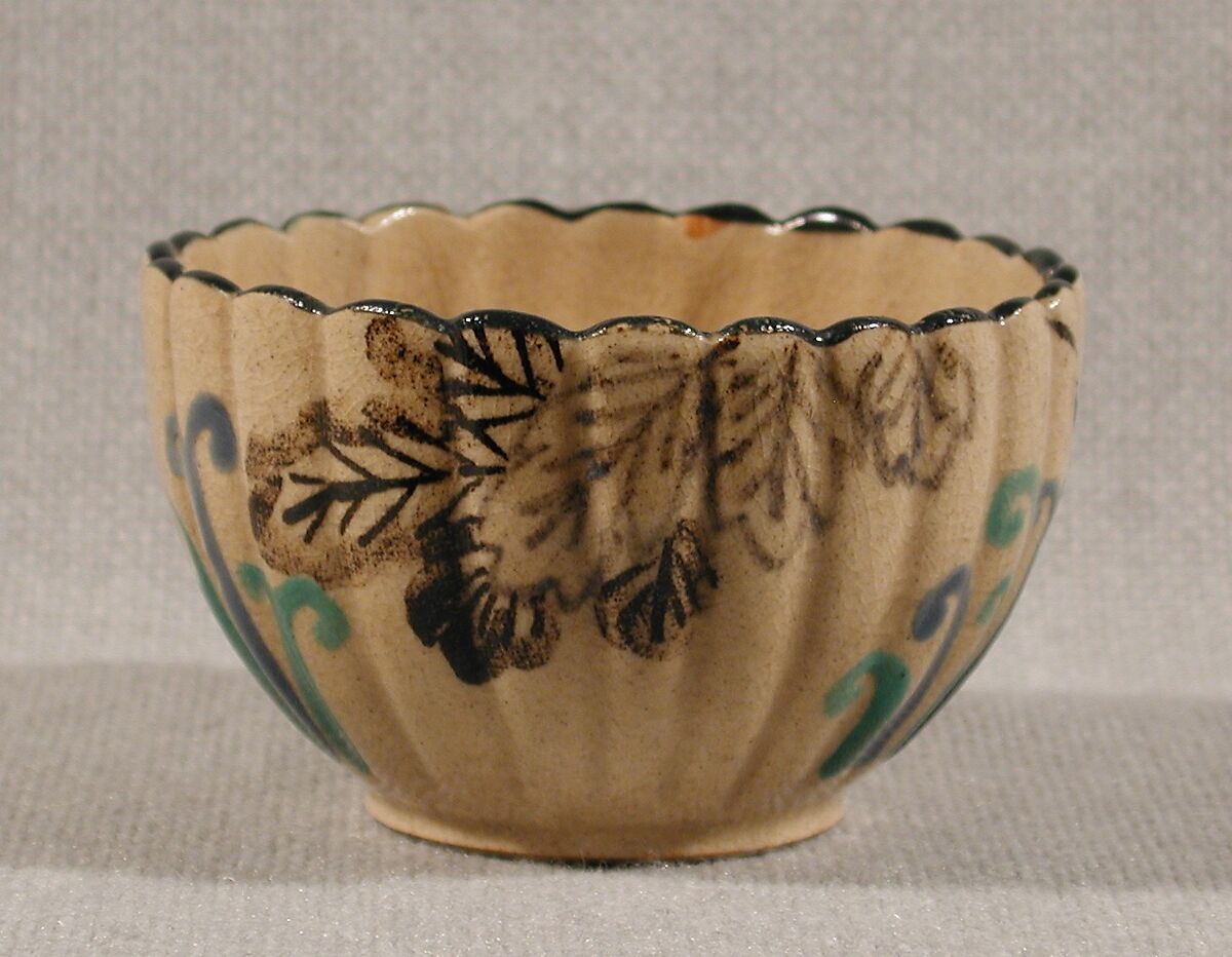 Blossom-Shaped Cup and Matching Cup Stand, Glazed pottery decorated with underglaze cobalt and iron and with overglaze blue and green enamels; Kyoto pottery of Ko-Kiyomizu type, Japan