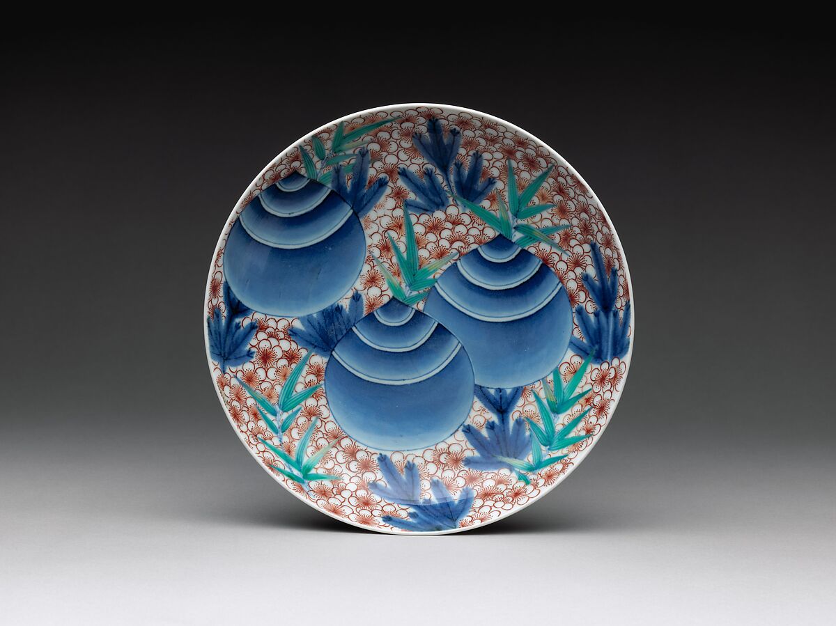 Dish with Sacred Jewels, Plum, Pine, and Bamboo, Porcelain painted with cobalt blue under and polychrome enamels over a transparent glaze (Hizen ware, Nabeshima type), Japan 