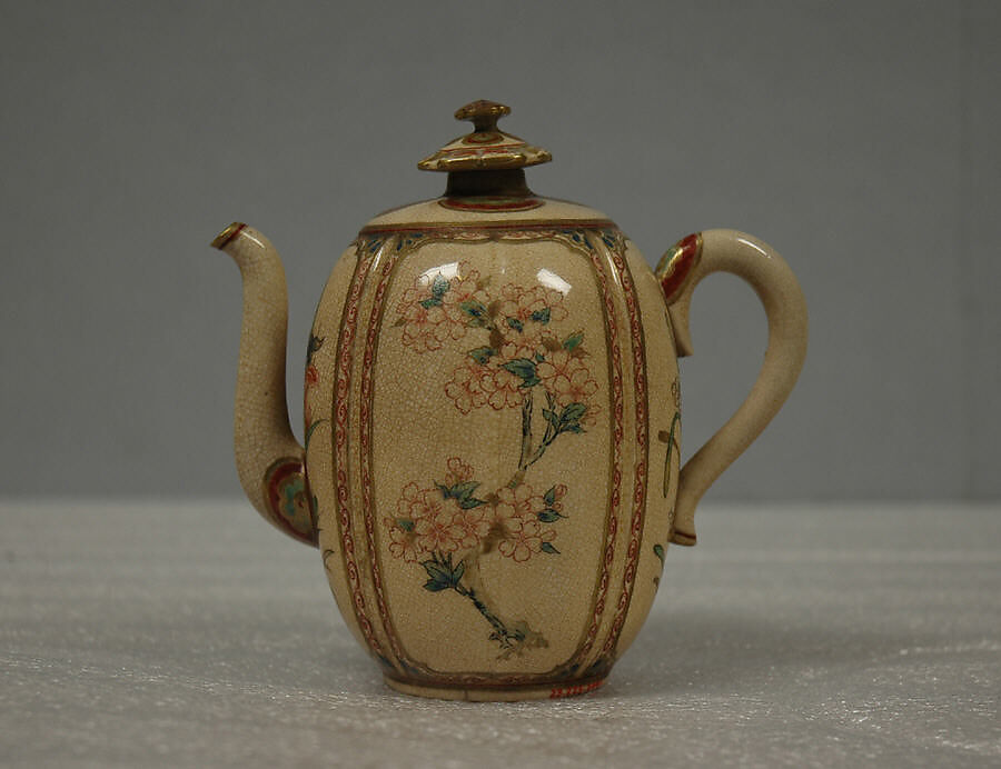 Wine pot, Hard paste faience, lustrous glaze, crackled, over decorations; enameled on top, handle and spout;  (Satsuma ware), Japan