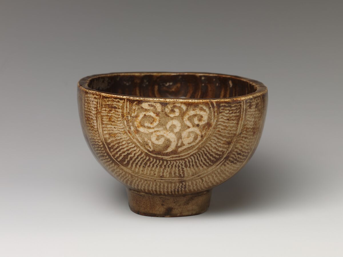 Tea Bowl with Cross Design, Clay with inlaid Mishima design under transparent crackled glaze; inside has flecked glaze (Kyoto ware), Japan