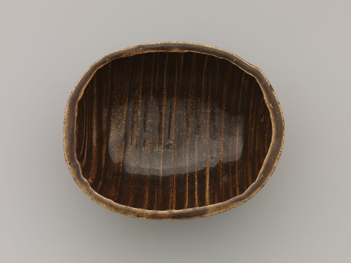 Tea Bowl with Cross Design, Clay with inlaid Mishima design under transparent crackled glaze; inside has flecked glaze (Kyoto ware), Japan