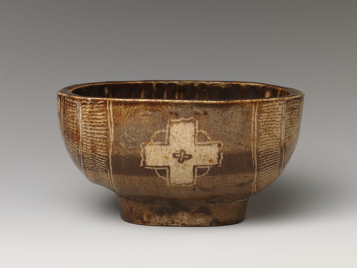 Tea Bowl with Cross Design, Clay with inlaid Mishima design under transparent crackled glaze; inside has flecked glaze (Kyoto ware), Japan 