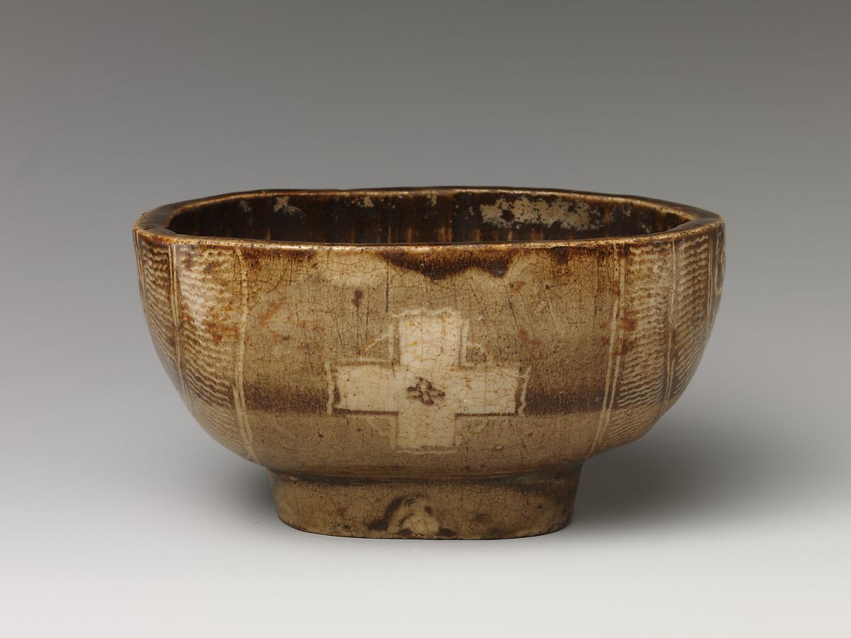 Tea Bowl with Cross Design, Clay with inlaid Mishima design under transparent crackled glaze; inside has flecked glaze (Kyoto ware), Japan