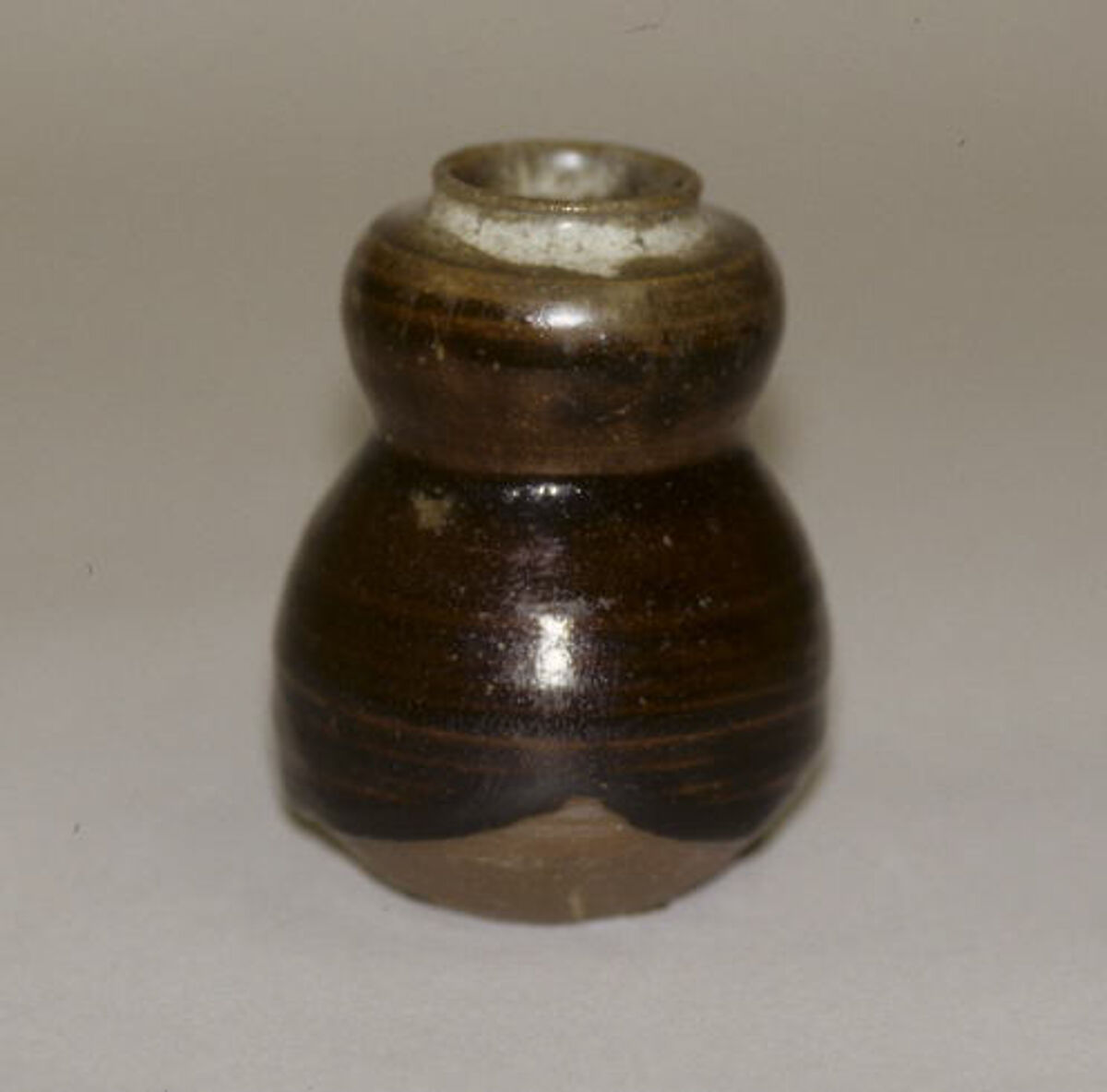 Tea jar, Clay, thick brown glaze with splashes on neck and shoulder (Seto ware), Japan