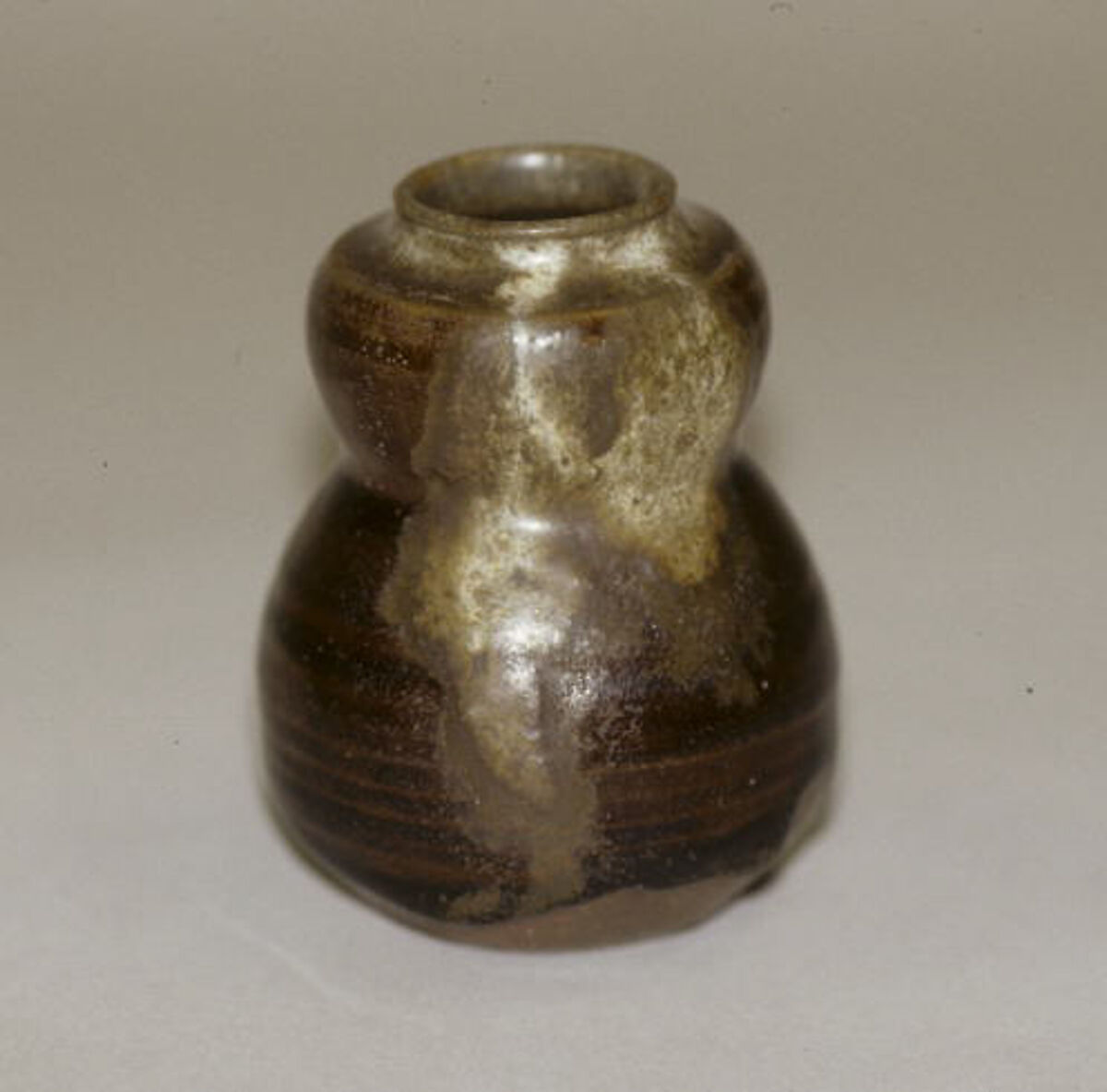 Tea jar, Clay, thick brown glaze with splashes on neck and shoulder (Seto ware), Japan
