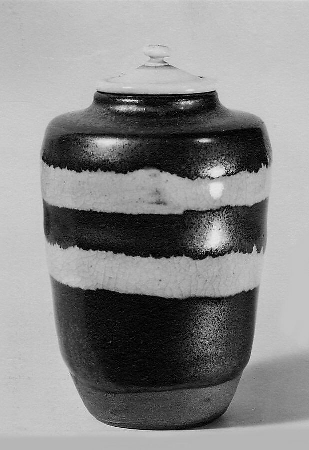 Tea jar, Nonomura Ninsei (Japanese, active ca. 1646–94), Clay; black glaze with two bands of crackled white glaze; (Awata ware), Japan