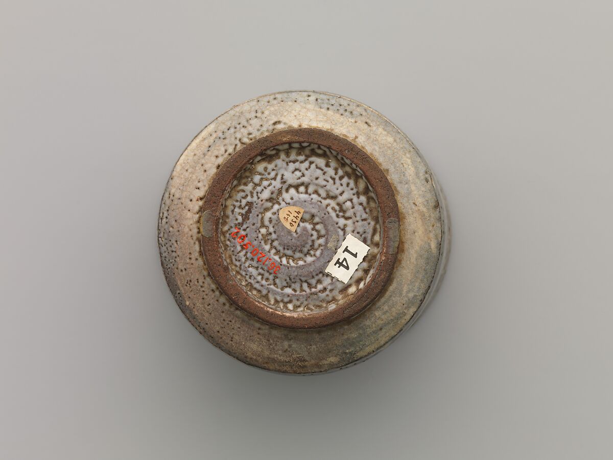 Tea bowl with decoration of chrysanthemums and wavy lines, Stoneware with stamped, white-slip design, Probably Korea