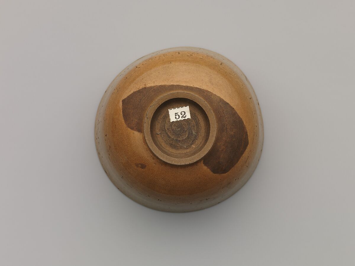 Teabowl, Clay;  glaze with waving lines and pattern in white Mishimi (Tsushima ware), Japan