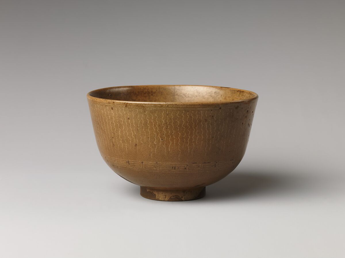 Teabowl, Clay;  glaze with waving lines and pattern in white Mishimi (Tsushima ware), Japan 