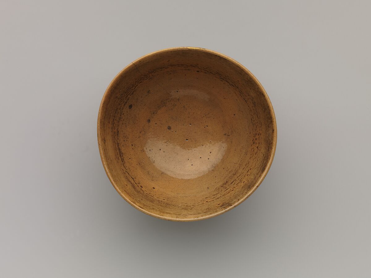 Teabowl, Clay;  glaze with waving lines and pattern in white Mishimi (Tsushima ware), Japan