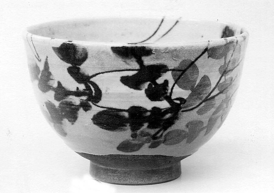 Teabowl, Roughly moulded, showing wheelmarks; fawn-colored clay, light gray glaze almost to the foot; design of daikon (large radish) in brown outlines with leaves in brown and blue (Awata ware), Japan 