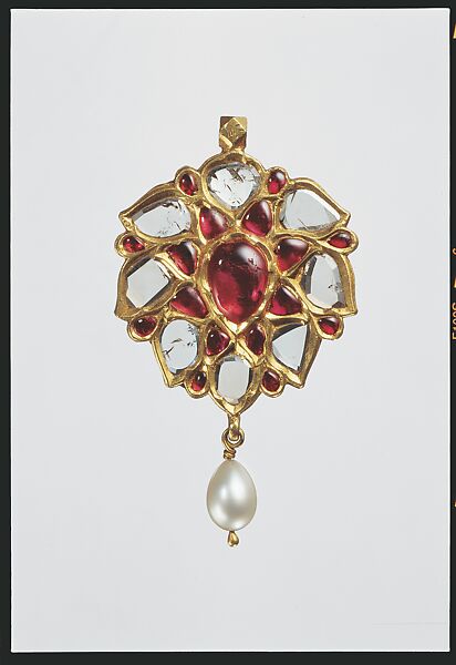 Floral Pendant with Drooping Petals, Fabricated from gold, worked in kundan technique and set with diamonds and rubies, with pendant pearl 