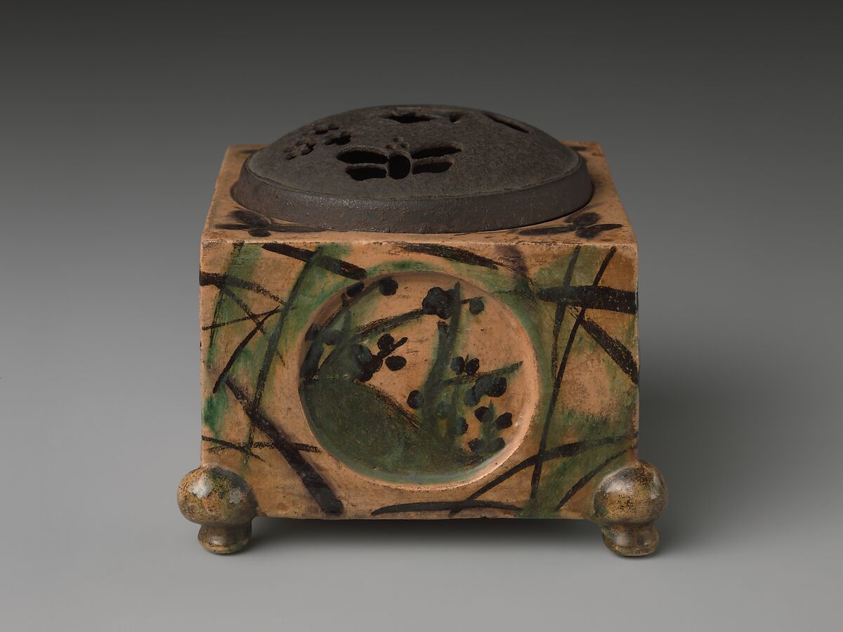 Incense Burner (kōro) with Design of Grasses, Cherry Blossoms and Butterflies, Hon'ami Kōetsu (Japanese, 1558–1637), Clay; yellow glaze; decoration of flowers, grasses and butterflies; perforated iron cover (Kyoto ware), Japan