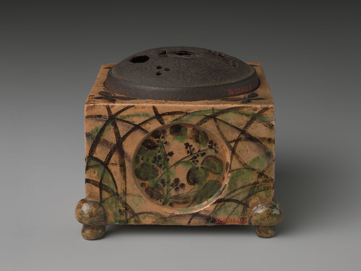 Incense Burner (kōro) with Design of Grasses, Cherry Blossoms and Butterflies, Hon'ami Kōetsu (Japanese, 1558–1637), Clay; yellow glaze; decoration of flowers, grasses and butterflies; perforated iron cover (Kyoto ware), Japan
