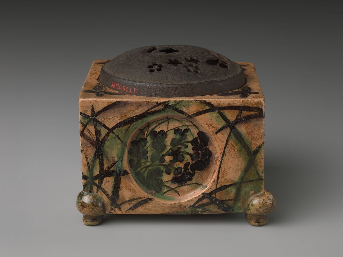 Incense Burner (kōro) with Design of Grasses, Cherry Blossoms and Butterflies, Hon'ami Kōetsu (Japanese, 1558–1637), Clay; yellow glaze; decoration of flowers, grasses and butterflies; perforated iron cover (Kyoto ware), Japan