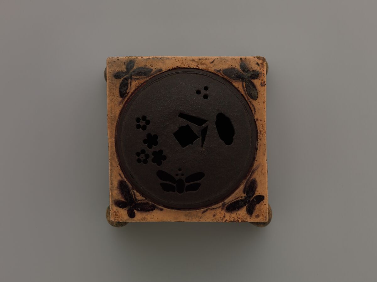 Incense Burner (kōro) with Design of Grasses, Cherry Blossoms and Butterflies, Hon'ami Kōetsu (Japanese, 1558–1637), Clay; yellow glaze; decoration of flowers, grasses and butterflies; perforated iron cover (Kyoto ware), Japan