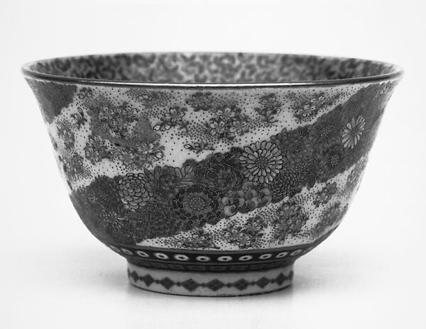 Small Bowl with Design of Diagonally Banded Millefleurs on Exterior and Butterflies on the Interior, Yabu Meizan (Japanese, 1853–1934), Porcelain; exterior, spiral millefleurs bands in a variety of enamels and gold; geometric bands in black and rust enamels and gold on lower part of bowl; interior, closely covered with tiny butterflies in red, black, yellow and pale blue enamels, with gold; gold lip rim (Satsuma ware), Japan 