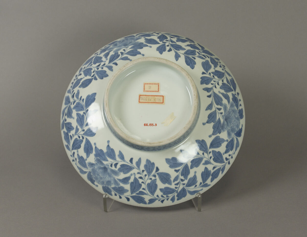 Dish with Assorted Treasures Floating on Waves, Porcelain with cobalt blue under transparent glaze (Hizen ware, Nabeshima type), Japan