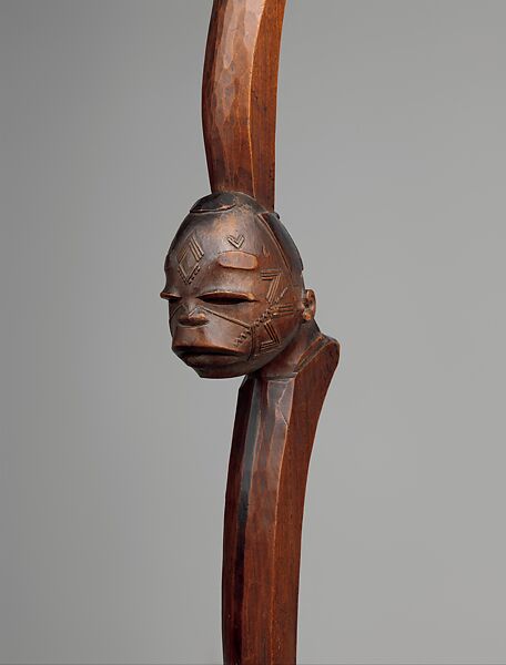 Simbo (ceremonial staff) with two heads, Makonde artist, Wood, Makonde