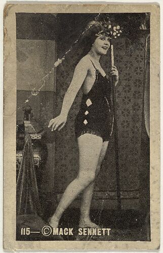 Card 115, Bathing beauty holding mask to face, from the Movie Stars series (T124), issued by John J. Bagley & Co. to promote Buckingham Cigarettes