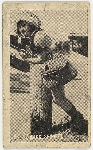 Card 5, Actress wearing bonnet and wicker bag leaning on wooden post, from the Movie Stars series (T124), issued by John J. Bagley & Co. to promote Buckingham Cigarettes, Original photograph by Mack Sennett, Photolithograph 