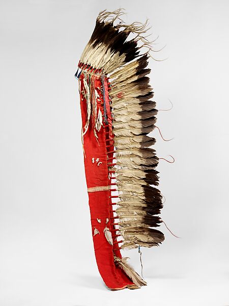 Feather Headdress, Eagle feathers, native tanned leather, rawhide, wool cloth and yarn, cotton cloth, glass beads, ermine, silk ribbon and horsehair, Oglala Lakota (Teton Sioux) 