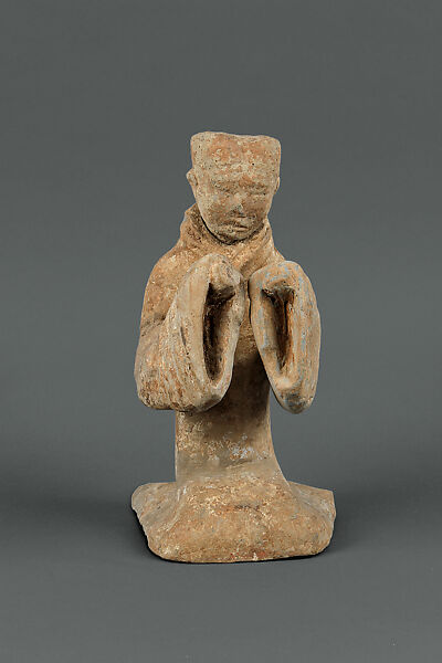 Female Musician Playing a Flute or Panpipe (Sheng?), Earthenware with pigment, China 