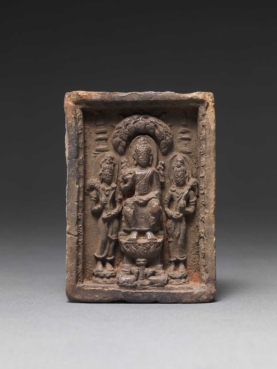 Seated Buddha Flanked by Two Bodhisattvas, Terracotta, Thailand 