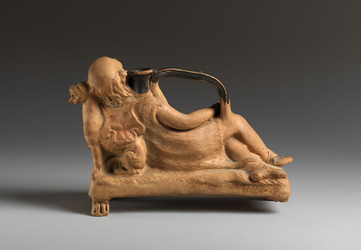 Terracotta askos in the shape of Silenus, Terracotta, with traces of red, Greek, South Italian