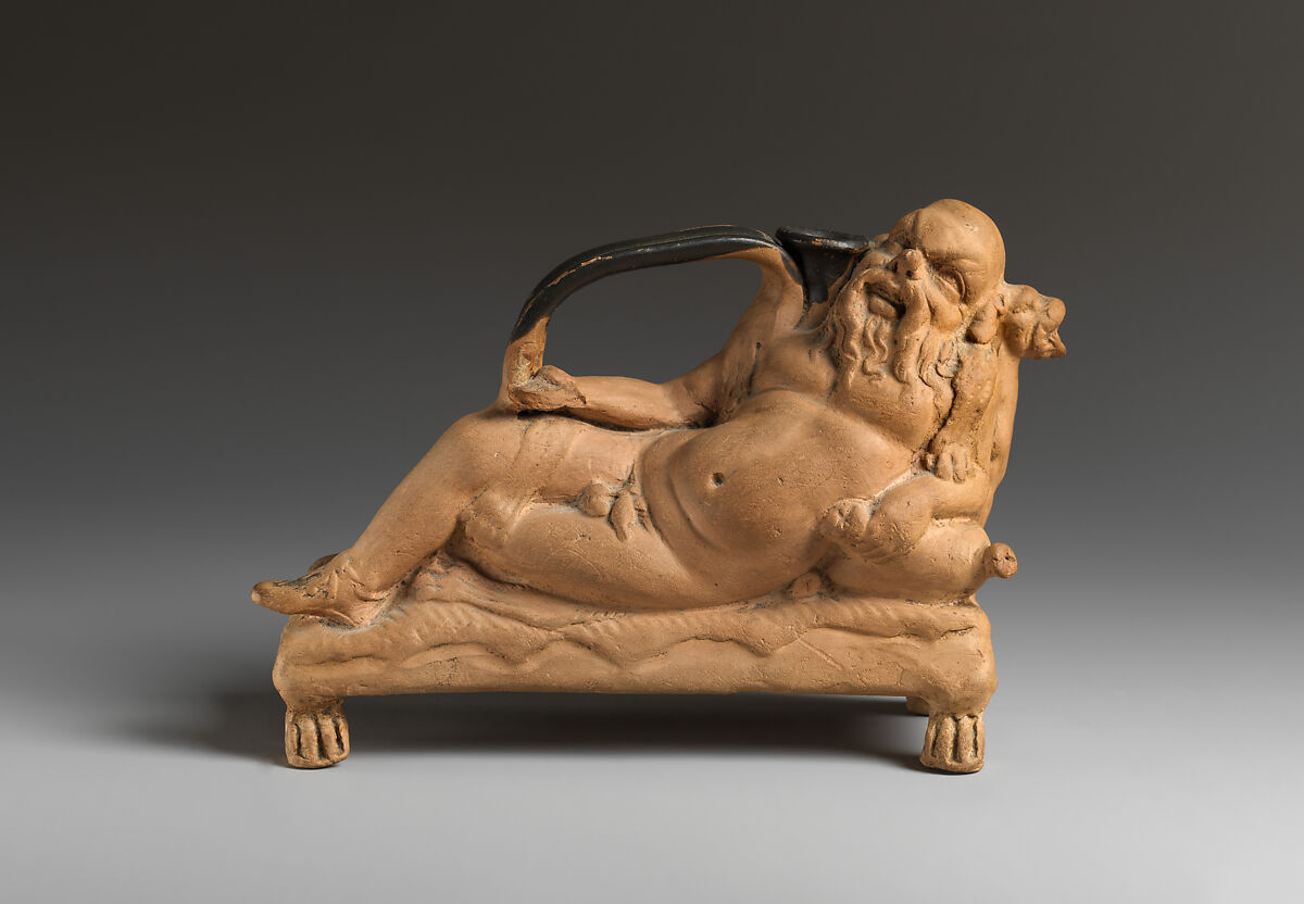 Terracotta askos in the shape of Silenus, Terracotta, with traces of red, Greek, South Italian 