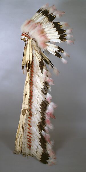 A Native American Indian in South Dakota with a eagle feather in his hair