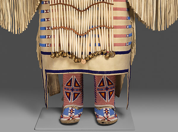 Woman’s Dress and Accessories, Jodi Archambault (American, Hunkpapa Lakota/Teton Sioux, born North Dakota, 1969), Tanned and commercial leather, glass and metal beads, cotton, silk, dentalium shell, metal cones, horsehair, plastic, brass bells, porcupine quills, coins, Hunkpapa Lakota (Teton Sioux)