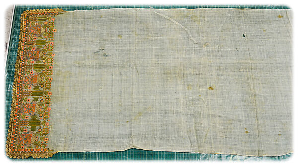 Gold Bordered Napkin with Pavillions, Cotton; embroidered in gold and silver metal wrapped thread