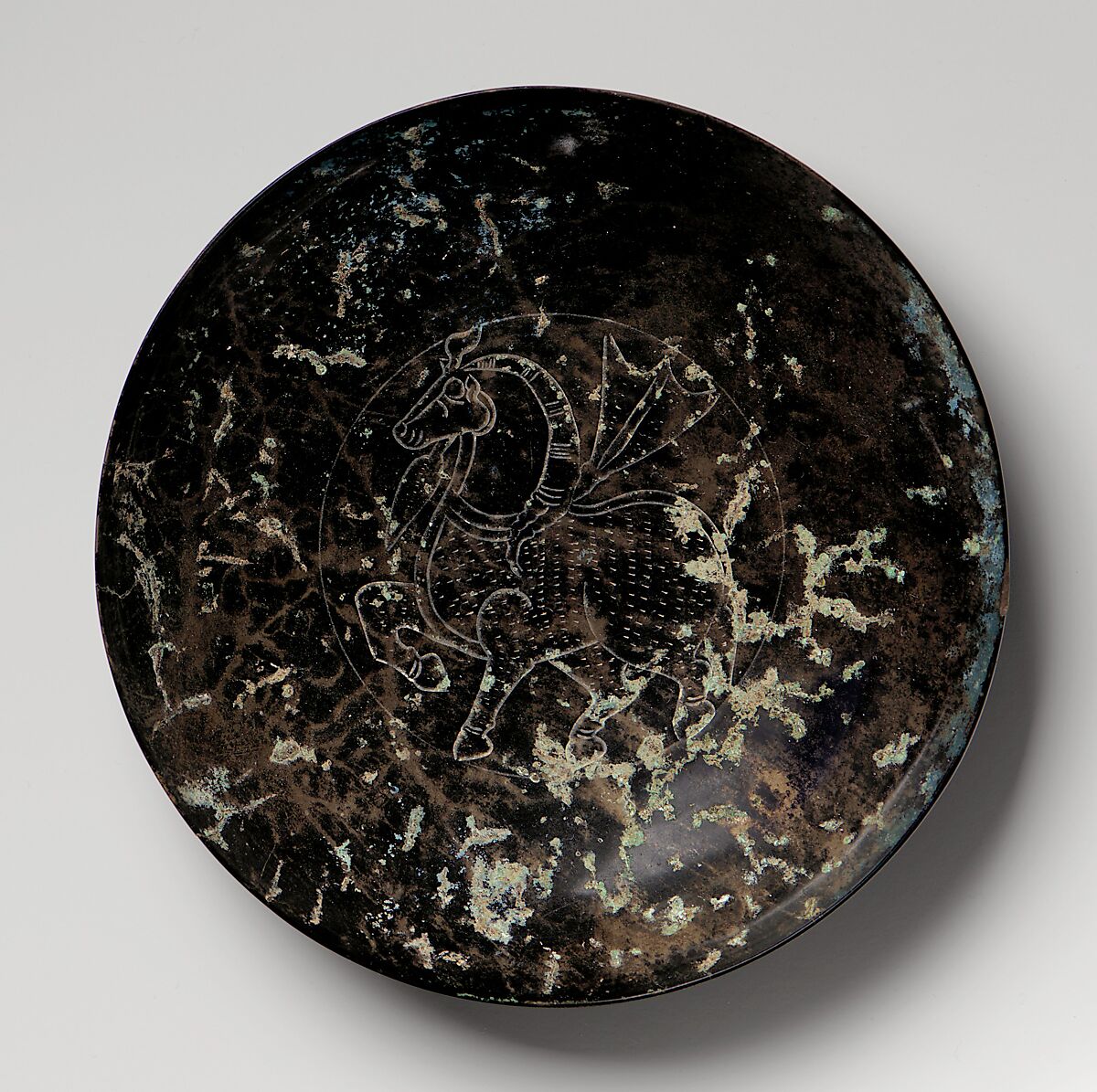 Plate with Horse Decoration, Bronze with high tin content, Central Asia or Eastern Iran 