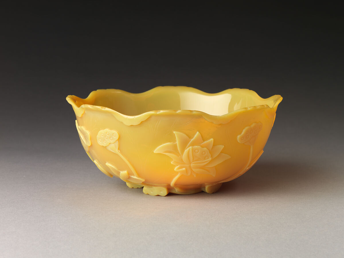Bowl in the shape of a lotus leaf, Yellow glass with carved and incised decoration, China