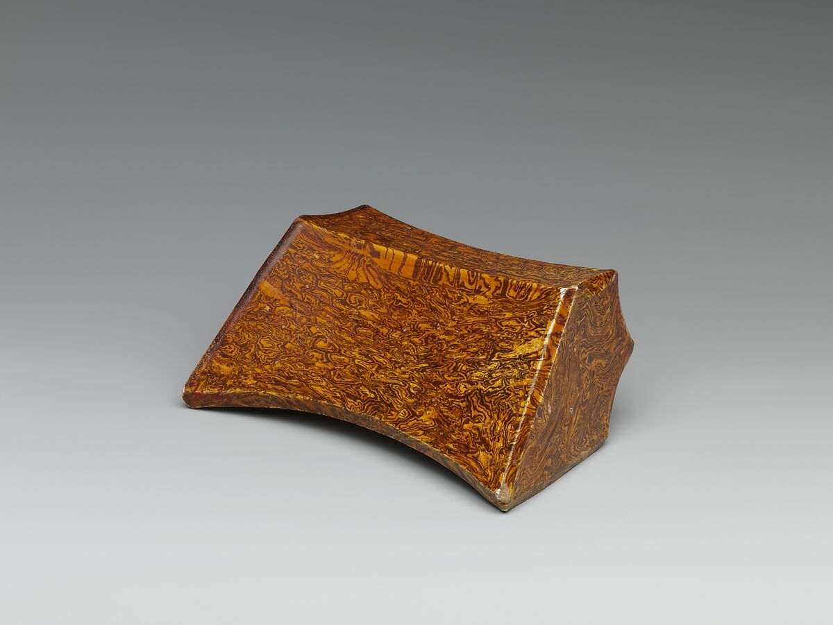 Pillow, Earthenware with marbled veneer and brown glaze, China 
