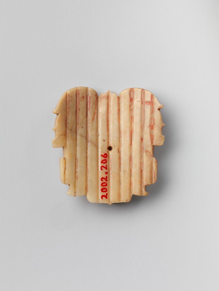 Plaque with mask designs, Jade (nephrite), China