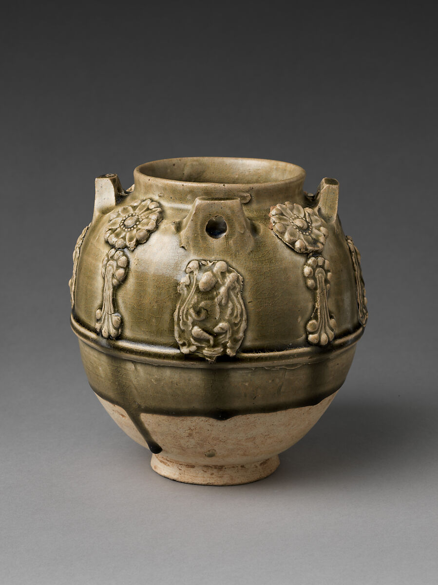 Jar with floral decorations and musicians, Stoneware with applied decoration under celadon glaze, China 